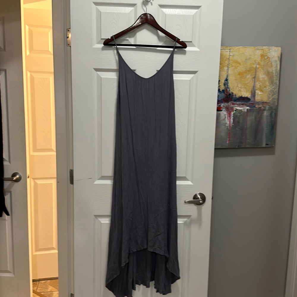 Light purple dress by pink stitch size 2 with built in slip. Adjustable straps
